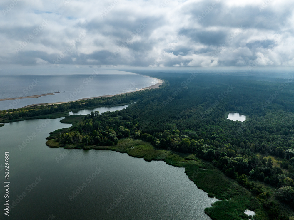 Baltic Sea and Vistula Estuary Aerial View. The Bay of Gdańsk at summer time. from above. Baltic Sea, Mikoszewo. Poland. Europe. Baltic Sea and Vistula Estuary Aerial View. The Bay of Gdańsk at summer time. from above. Baltic Sea, Mikoszewo. Poland. Europe.