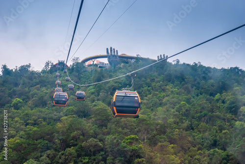 Cable cabs are running on high wire at Bana Hills in Danang, Vietnam Fototapet