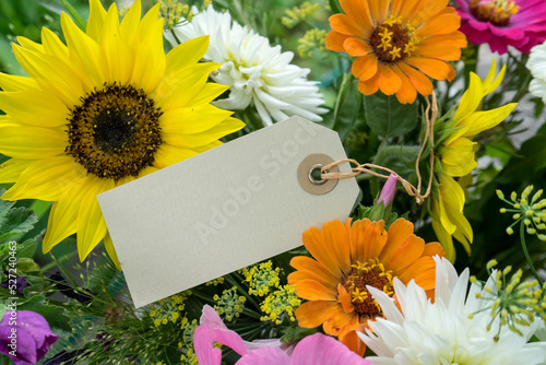 Greeting card with copy space and colorful summer flowers