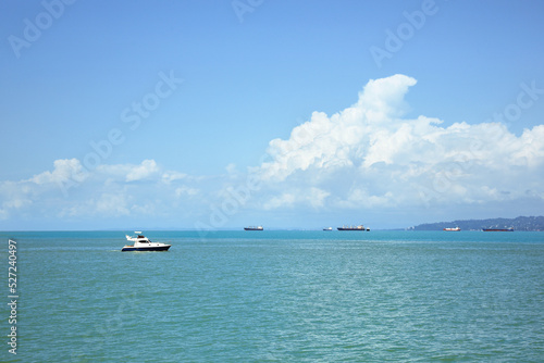 Beautiful tranquil sea with boats on sunny summer day © New Africa