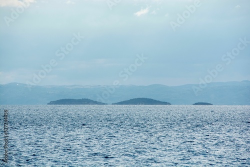 Beautiful blue sea, Cruise from Amaliapoli to Skiathos in Greece photo