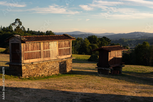Traditional architecture, granaries at sunset photo