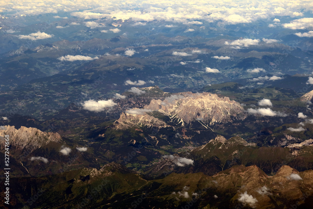 The Alps - the highest and most extensive mountain range system  in Europe. Alps seen from the airplane window