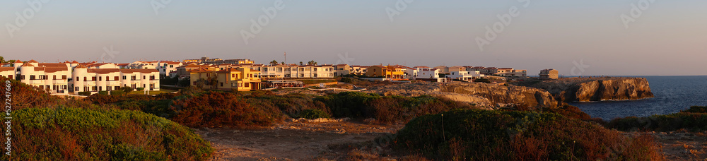 The western part of Menorca (Minorca), Spain. The coast of Menorca just before sunset. Menorca's wildlife. Cliffs on the coast The western part of Menorca (Minorca), Spain. The coast of Menorca just before sunset. Menorca's wildlife. Cliffs on the coast