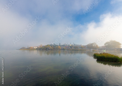 The golyazi village on the shores of the Uluabat lake in bursa. Landscape from Golyazi with green nature and reflection photo