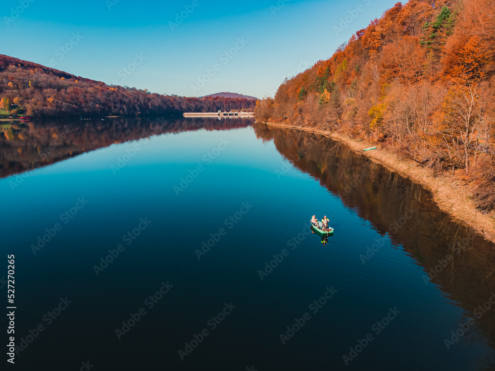 Bieszczady Stills boat going down the river autumn forest scenery outdoors copy space . High quality photo