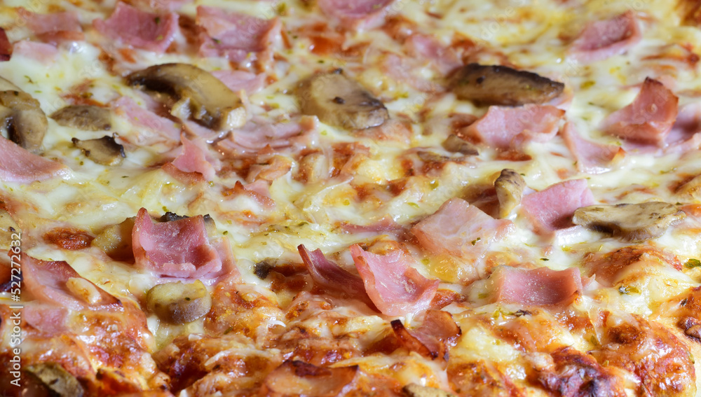 Close up, pizza, sweet ham, cheese, tomato sauce and mushroom.