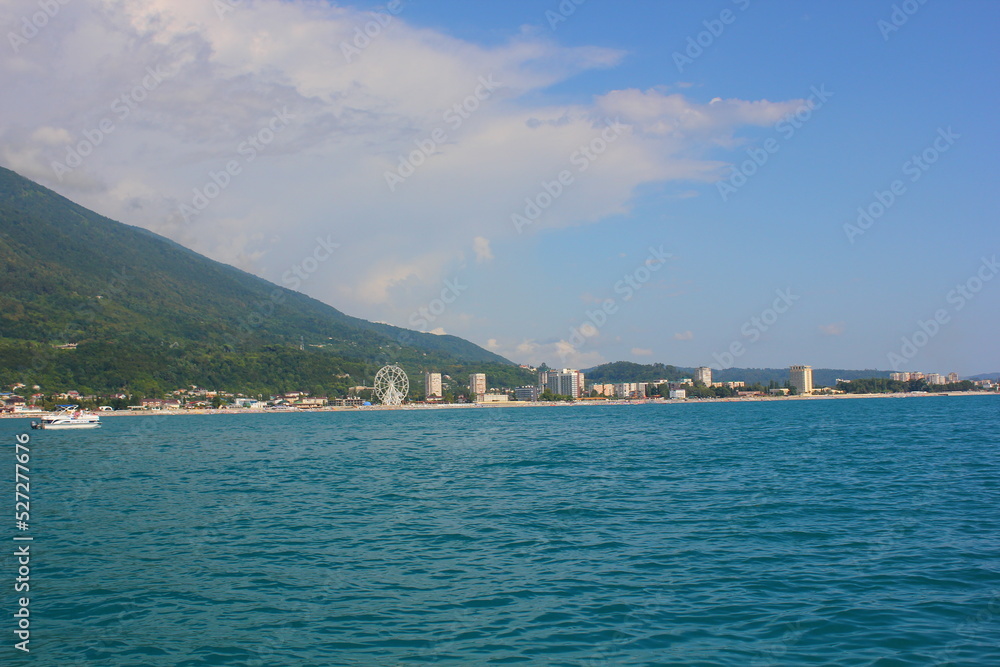 view of the city of gagra and the mountain from the black sea