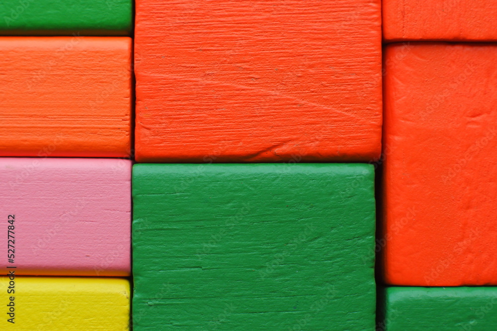 Fototapeta premium Color blocks. Multicolored wooden cubes. Multicolored blocks. Wooden blocks. Children's constructor. Building material.