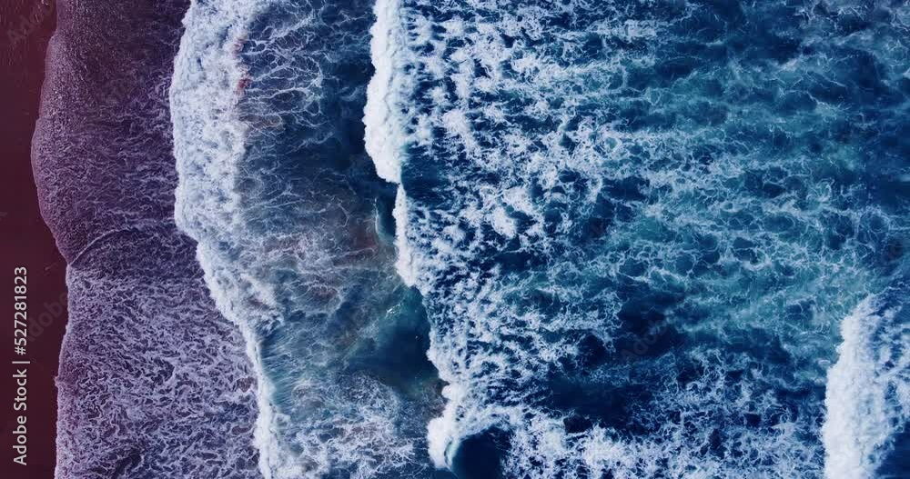 Aerial view texture of big power dark ocean waves with blue ocean. Aerial top-view footage of fabulous sea tide on a stormy day. Drone filming breaking surf with foam in Andaman sea. 4K 4096x2160p Aerial view texture of big power dark ocean waves with blue ocean. Aerial top-view footage of fabulous sea tide on a stormy day. Drone filming breaking surf with foam in Andaman sea. 4K 4096x2160p