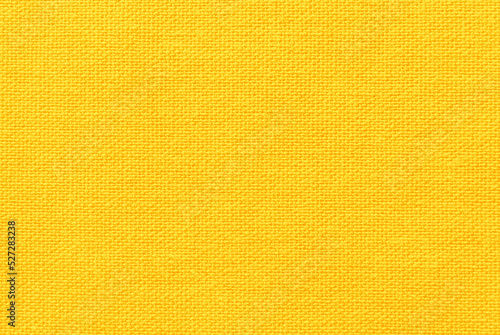 Yellow canvas texture, bright yellow linen texture as background