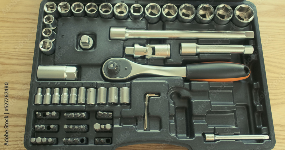 set of tools, takes a ratchet socket wrench. Top view, close-up. set of tools, takes a ratchet socket wrench. Top view, close-up.