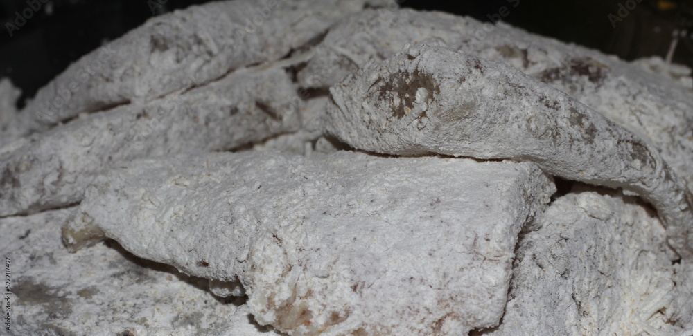 fish fillet with flour for breading, breaded fish ready to fry, raw