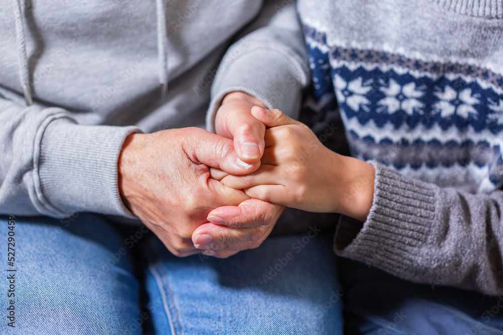 Hands of senior woman and a child, care and support