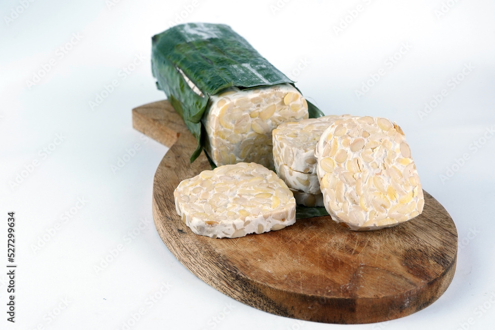 Tempe: made of soy beans fermented in banana leave Tempe: made of soy beans fermented in banana leave
