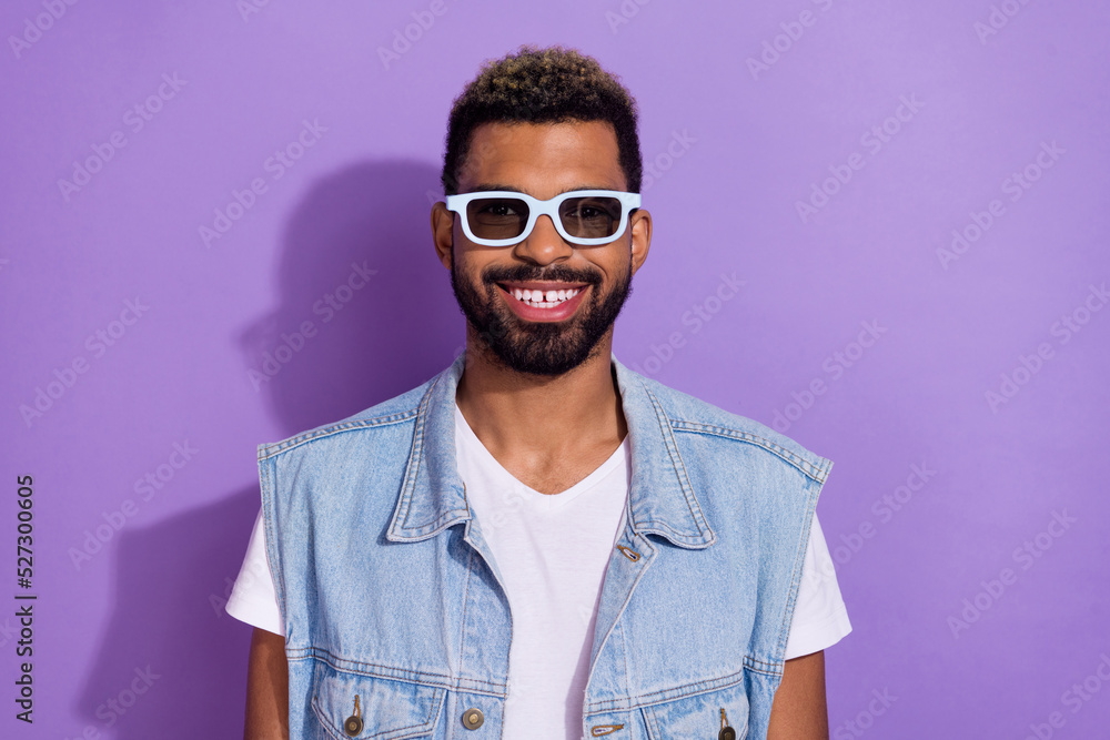 Photo of cool funny guy dressed denim vest dark eyewear smiling