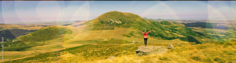woman enjoying panorama countryside landscape (Auvergne, Cantal ) woman enjoying panorama countryside landscape (Auvergne, Cantal )