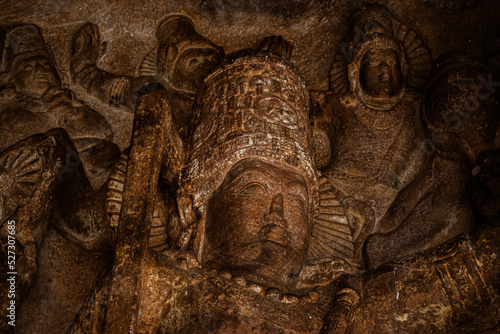 Sculpture of lord Vishnu as trivikrama avatar at Badami, Karnataka, India photo