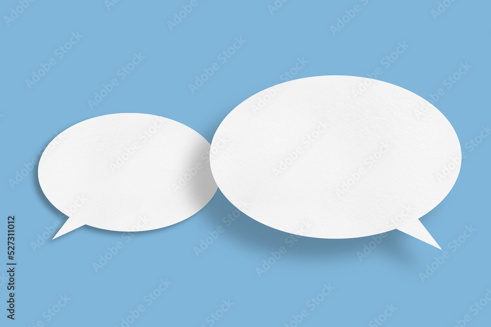 white paper with speech bubbles isolated on blue background communication bubbles white paper with speech bubbles isolated on blue background communication bubbles