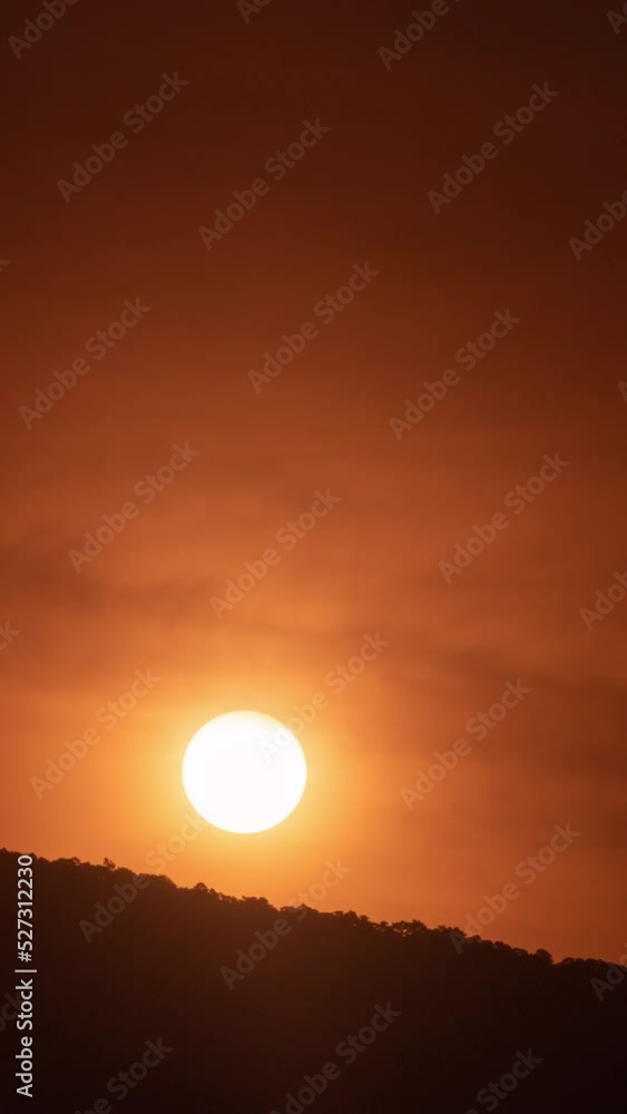 Timelapse of dramatic sunrise with orange sky in a sunny day. Timelapse of dramatic sunrise with orange sky in a sunny day.