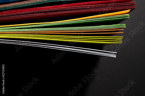 Abstract color rainbow strip curl line paper background.