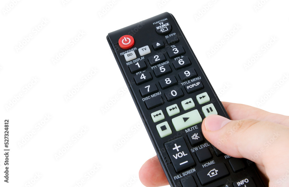 Hand holding remote control, isolated Hand holding remote control, isolated
