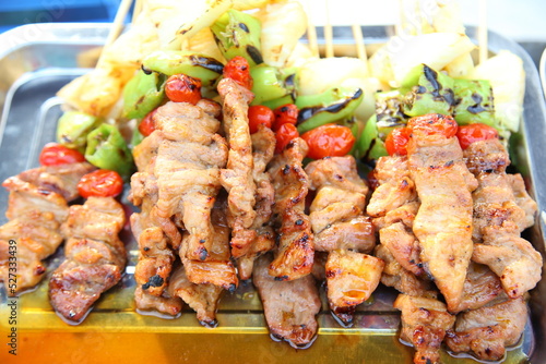 Pork Barbecue with Ketchup in a Thai market , Thai traditional style