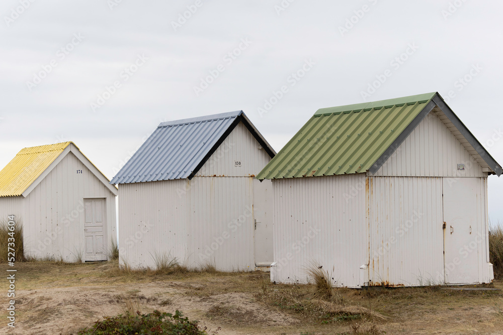 Beach cabins in Gouville sur Mer, Manche, Normandy, France in various lights Beach cabins in Gouville sur Mer, Manche, Normandy, France in various lights