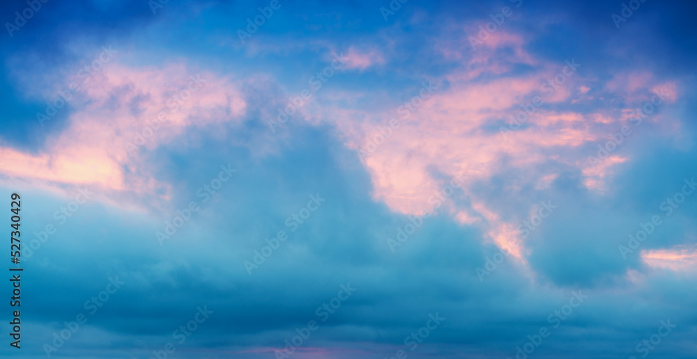 Amazing red sunset sky with clouds over ocean Amazing red sunset sky with clouds over ocean