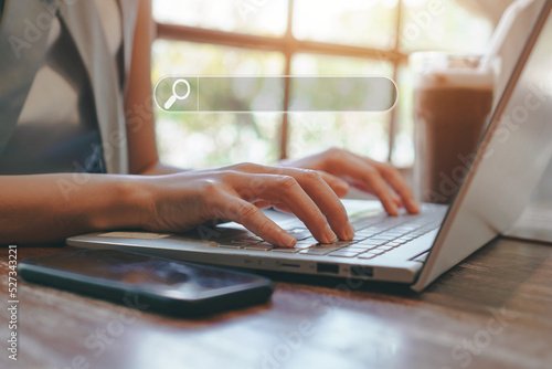 female using laptop,searching on internet,browse on worldwide data