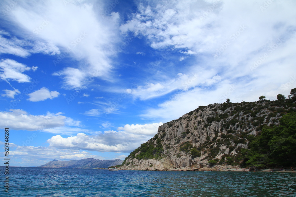 Clean Adriatic Sea and mountain peaks in Croatia