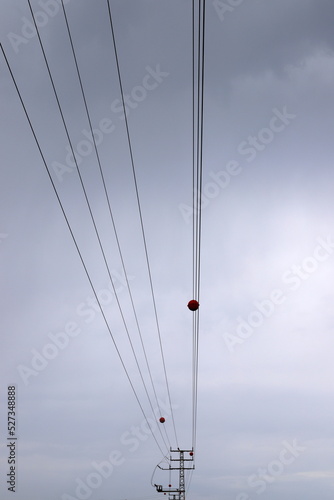 Electrical wires carrying high voltage current.