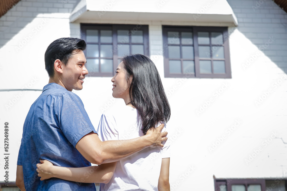 Asian couples are happy to have a new home. Moving house. Family concept. real estate business