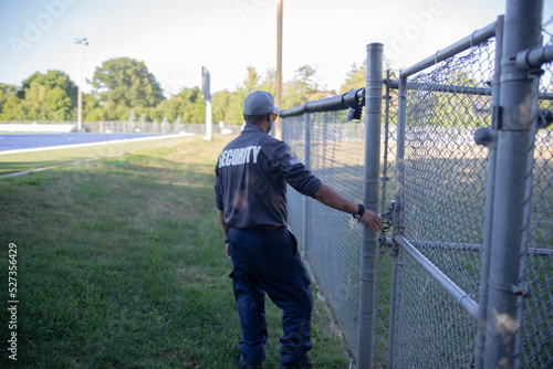 Security guard patrolling soccer stadium © Flex_Point_Security