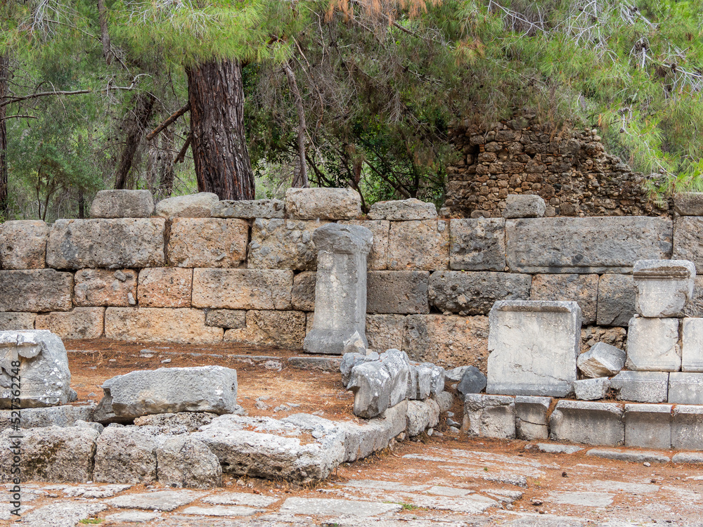 Ruins of Phaselis, Greek and Roman city on the coast of ancient Lycia. Architectural landmark in Kemer district of Antalya Province in Turkey. Ruins of Phaselis, Greek and Roman city on the coast of ancient Lycia. Architectural landmark in Kemer district of Antalya Province in Turkey.