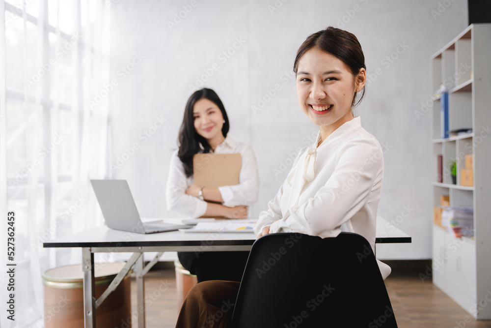 Smiling Asian businesswoman working on laptop in modern office Accountant Concept Finance Expert Analyze Business Report Graph financial chart financial chart corporate economy Banking Market Research Smiling Asian businesswoman working on laptop in modern office Accountant Concept Finance Expert Analyze Business Report Graph financial chart financial chart corporate economy Banking Market Research