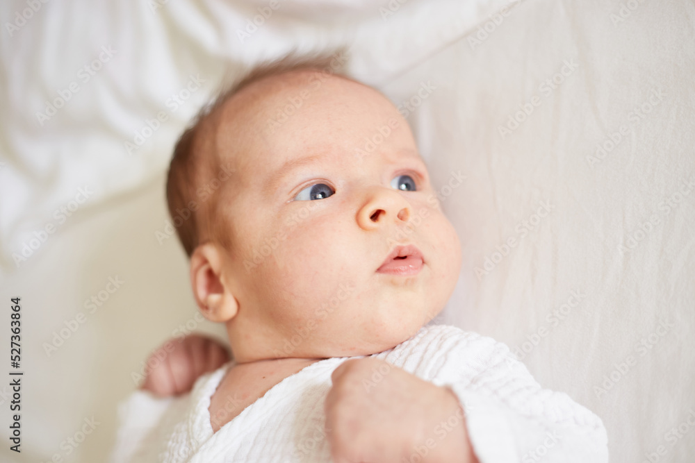 newborn one month old baby boy. smiling baby newborn one month old baby boy. smiling baby