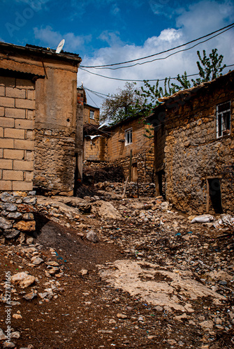 Canvas Print Stone houses built by superimposition method from ancient architectural structur
