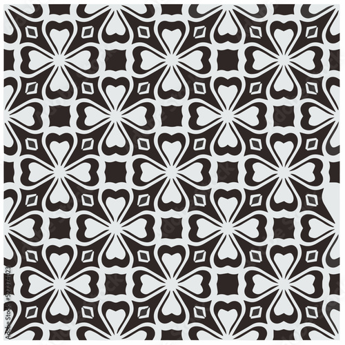 Design seamless monochrome geometric pattern. Abstract background. Vector art.Perfect for site backdrop, wrapping paper, wallpaper, textile and surface design. 