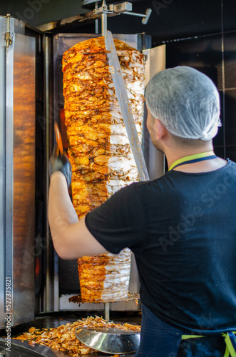 master chef who cuts doner kebab. doner master. selective focus