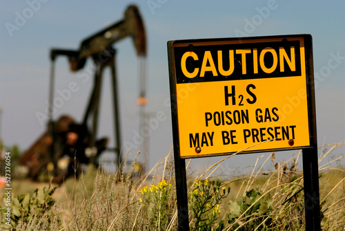 United States, New Mexico, Hobbs, Poison gas sign in oil field photo