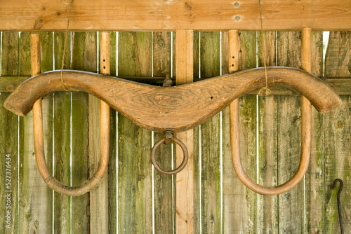 Yoke hanging on wooden barn