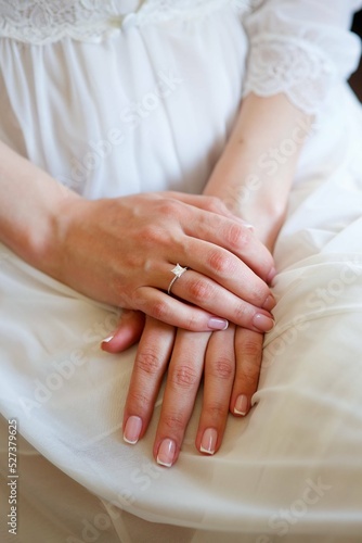 Elegant female hands of bride