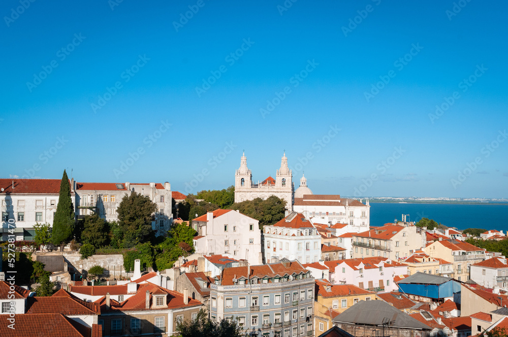 Tourist view of Churches, Rooftops and cityscape of Lisboa, Portugal