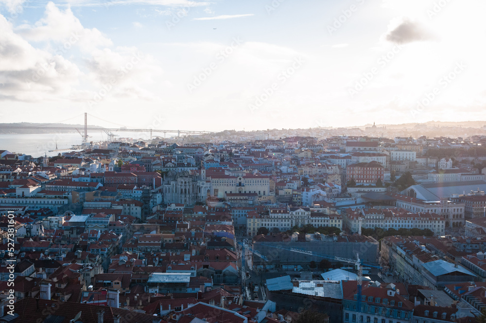 View of the city and Orange Clay Rooftops overlooking the Tagus River in Lisbon, Portugal