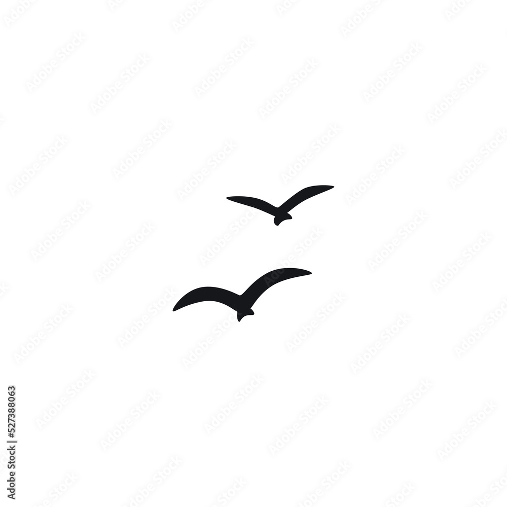 Naklejka premium A flock of flying silhouette birds. Vector illustration