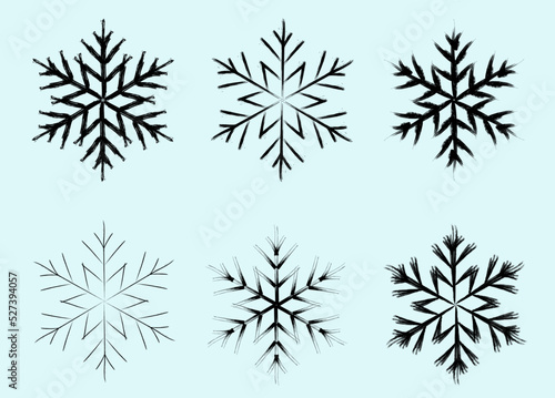 Grunge brush stroke snowflakes  free hand  vector  isolated
