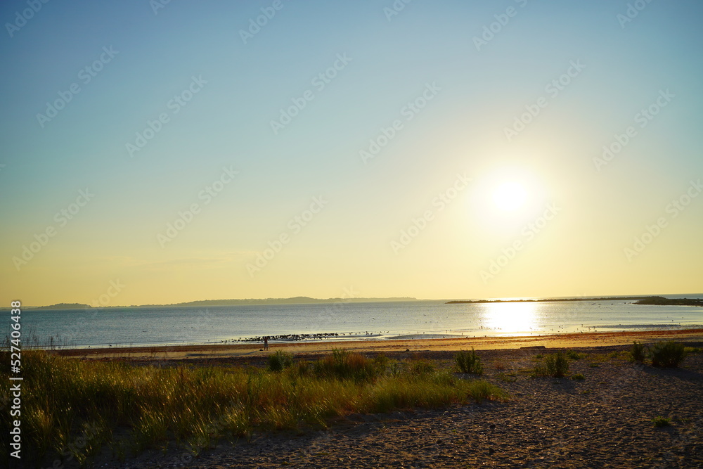 Obraz premium The morning of Revere Beach, Revere, Massachusetts, USA. It is a first public beach in America. It is close to Boston Logan Airport 
