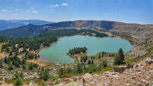 Fototapeta Naklejka Na Ścianę i Meble -  The Neila lagoons are a group of impressive lakes of glacial origin surrounded by peaks of about 2000 meters high, to the south of the Sierra de la Demanda located in the province of Burgos.