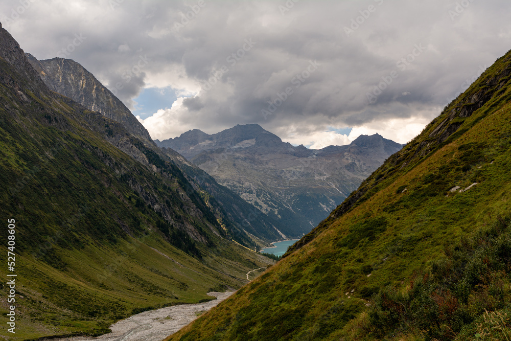 Fototapeta premium Impressive alpine view of high peaks in summer